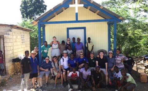 Volunteers with Be Like Brit build a home for a needy family in Haiti over the course of a week