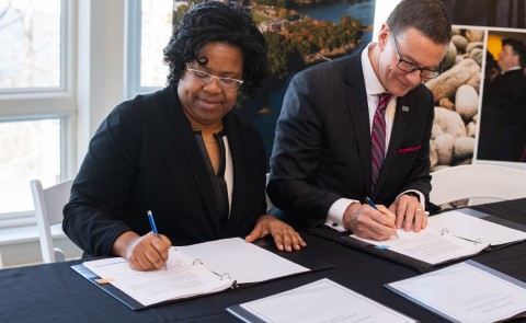 President Herbert and Dean Conway signed the agreement on January 30 at the Arthur P. Girard Marine Science Center