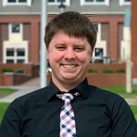 Gregory Blackman smiles at the camera