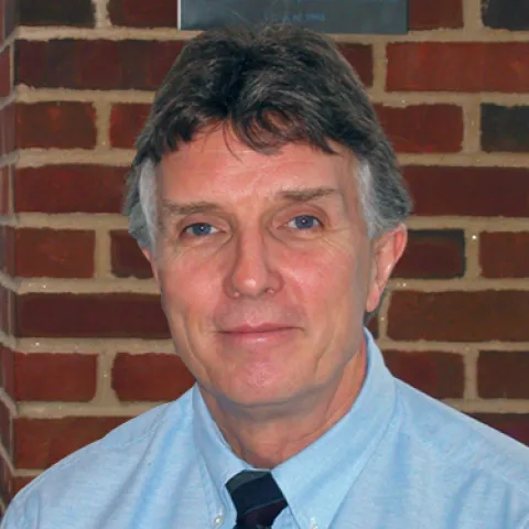 Headshot of James Norton