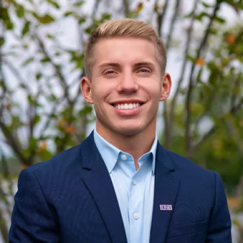 U N E board of trustees student trustee Brock Johndro