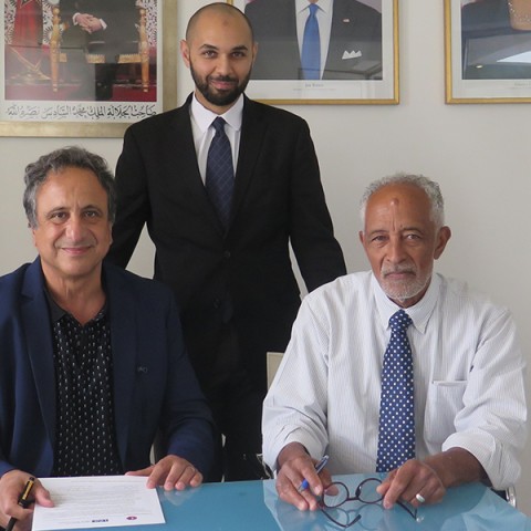 Anouar Majid and CAS Director John Randolph signed the agreement in the presence of Mr. Omar Laafoura, the chair of CAS' board of trustees.