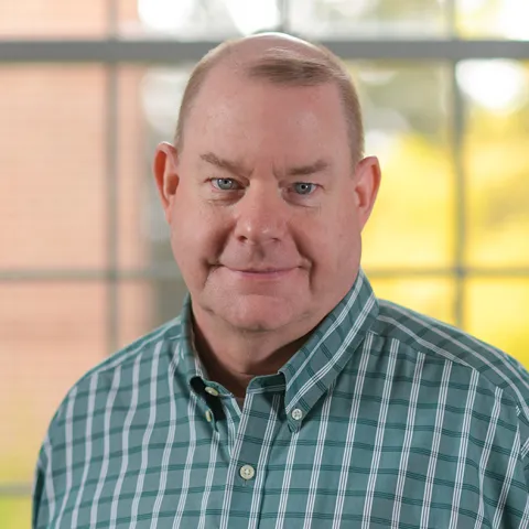 Headshot of Joe Carter