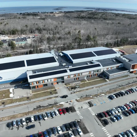 A solar array is shown on the roof of the Harold Alfond Forum in Biddeford
