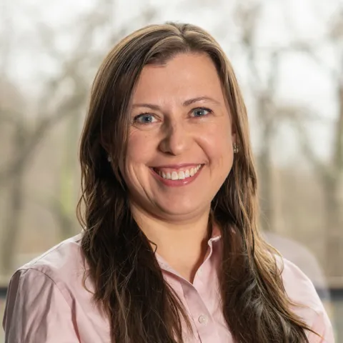 Headshot of Eva Rose Balog