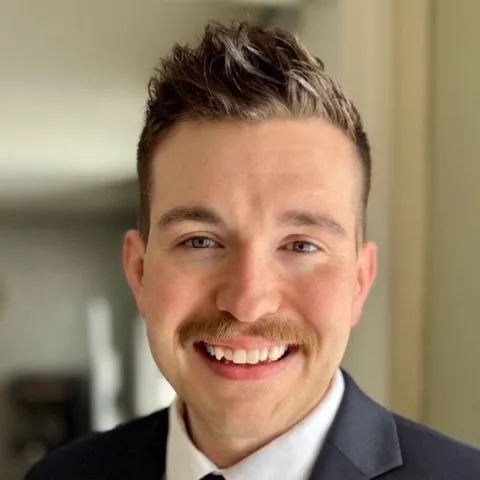 Headshot of U N E alum Brendon Hotham