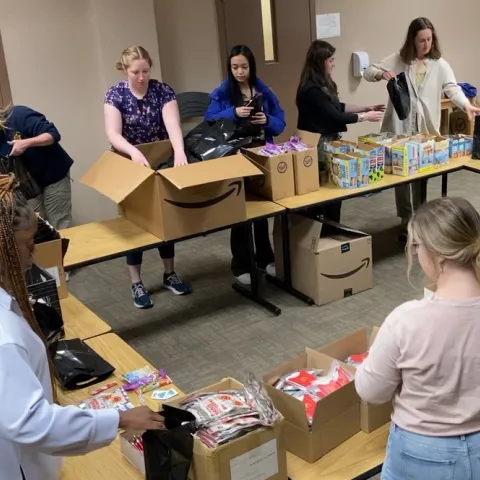 Students assemble harm reduction kits at the Cumberland County Jail