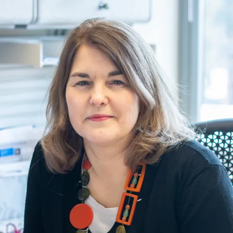 Portrait of U N E employee Karen Eck