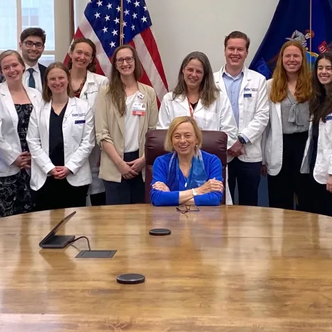 UNE medical students and administration pose with Maine Gov. Janet Mills