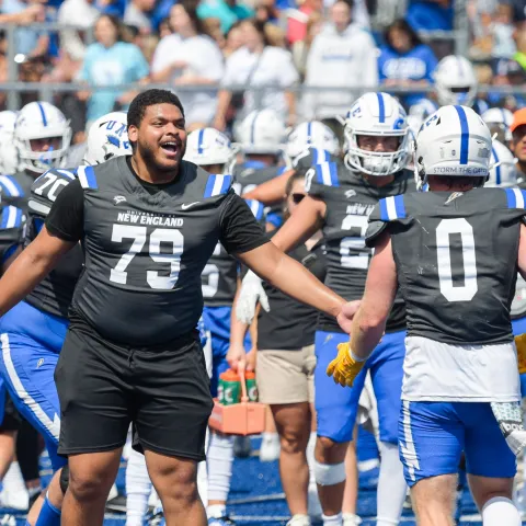 UNE senior who aims to help children finds hope on the University campus where he helped spread it