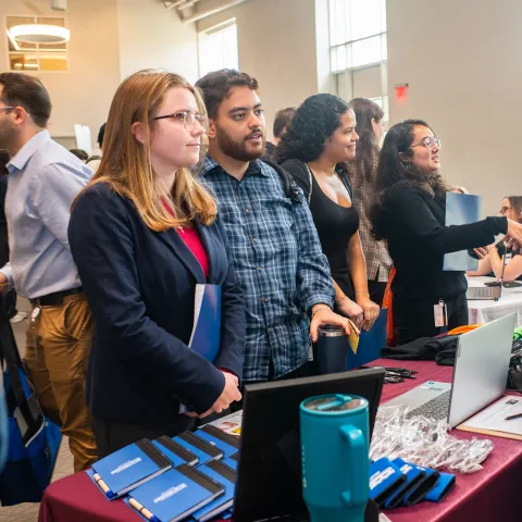 UNE dental students participate in a career fair