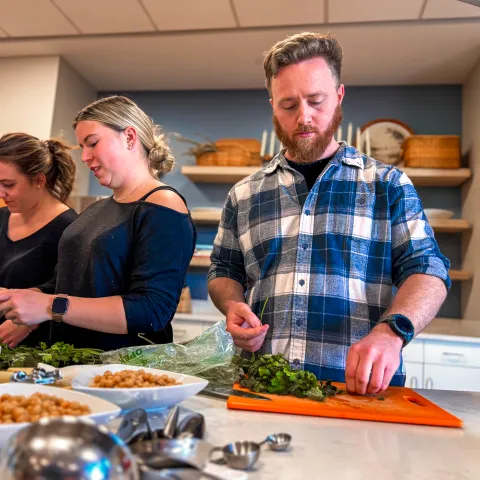Students chop fresh herbs