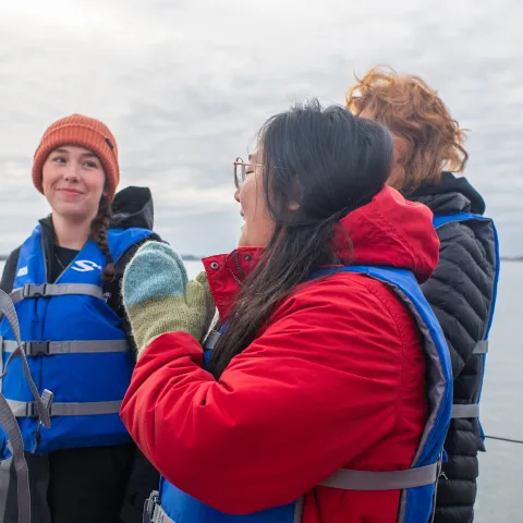  Jasmin Townsend-Ng (’26) claps while the team celebrates buoy deployment