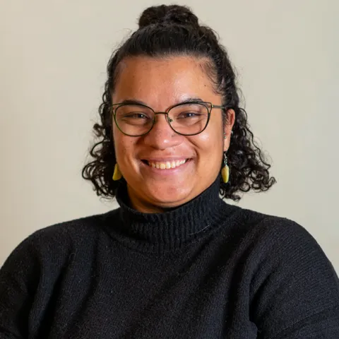 Headshot of Thea Hollman