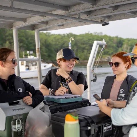 Kara Mickiewicz, Michelle Caputo, and other UNE students