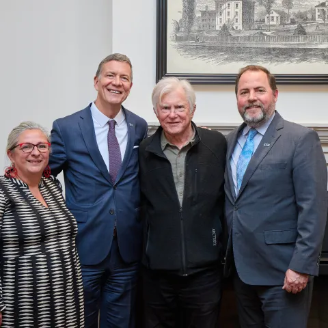 UNE's Gwen Mahon, James Herbert, and Jim Irwin with David Shaw