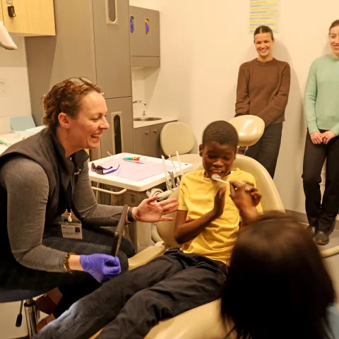 A pediatric patient receives dental care