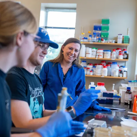 Eva Rose Balog with students in her lab